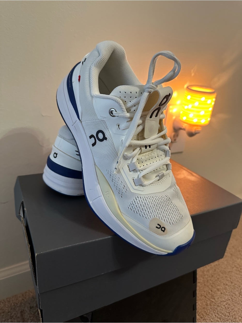On The Roger Pro Women’s White Mesh Trainer with Light Gray Details